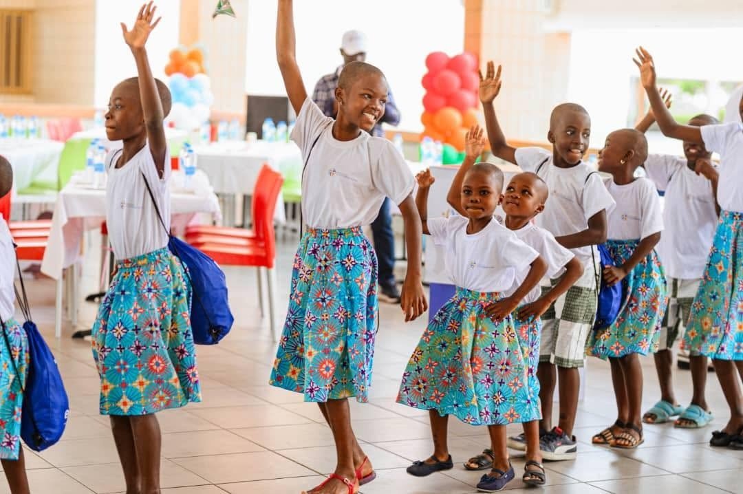 Children dancing at a Foundation gathering