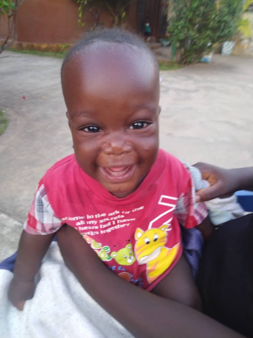 Manassé smiling.