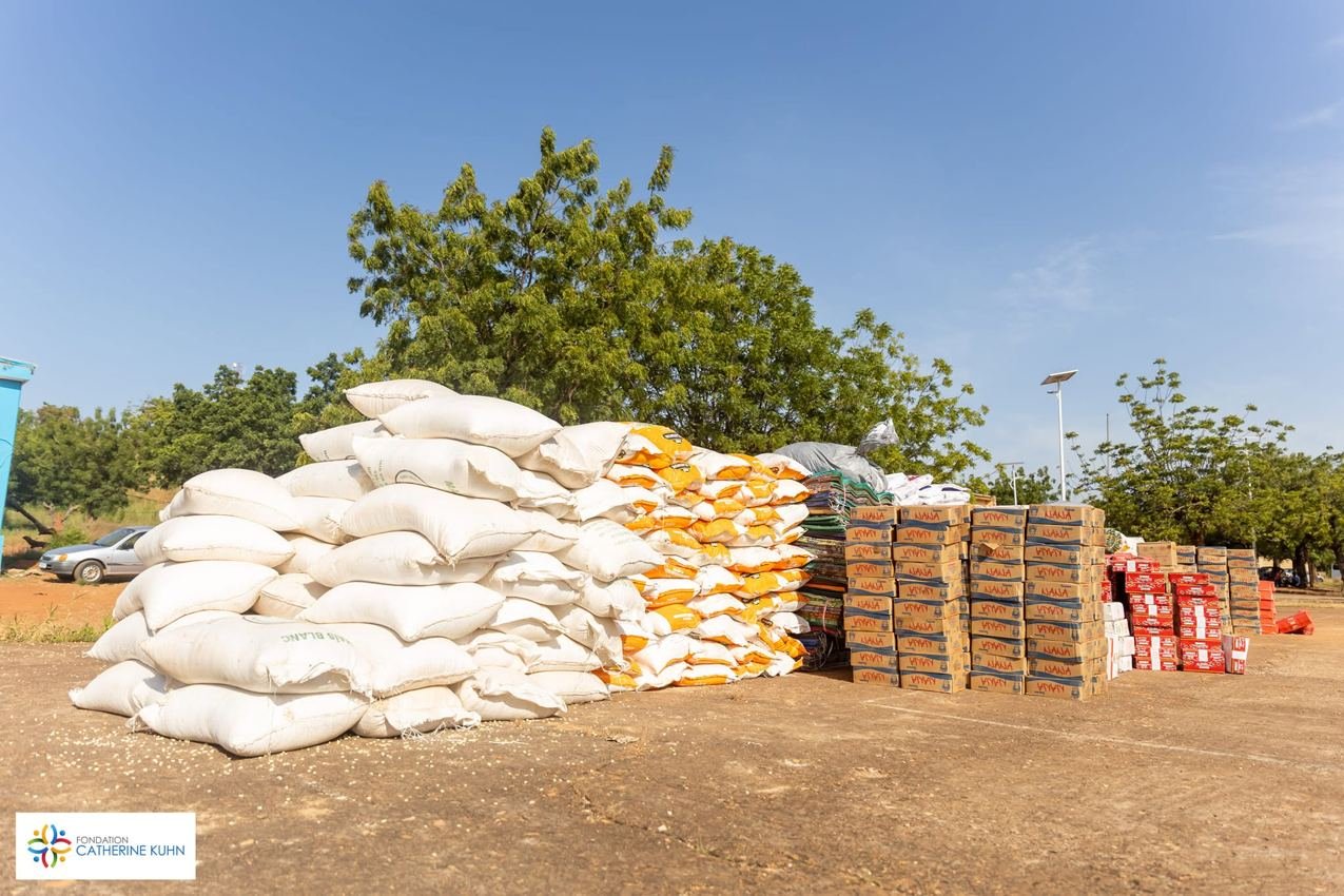 Food supplies and mats gathered for distribution.
