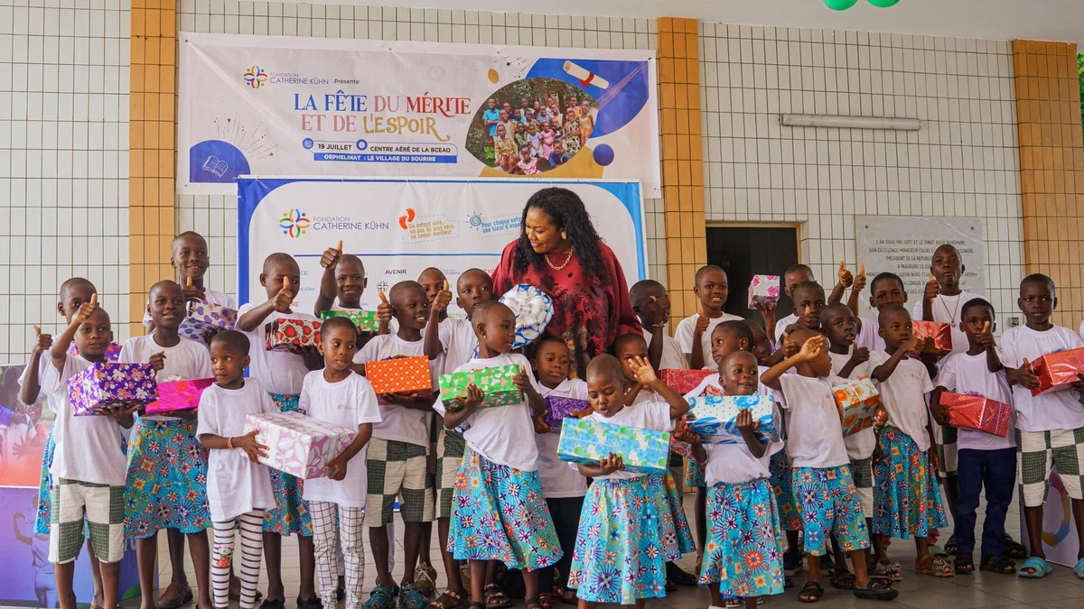 Children with their gifts at the celebration of achievement and hope